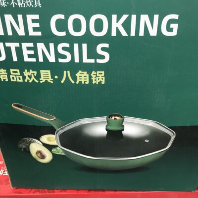 Green saucepan with glass lid